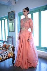 Hand embroidered peach hued blouse skirt and dupatta