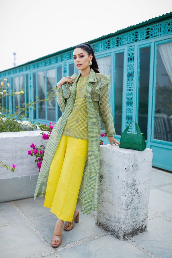 Apple green and lime yellow top combined with flap jacket and solid colour straight pants